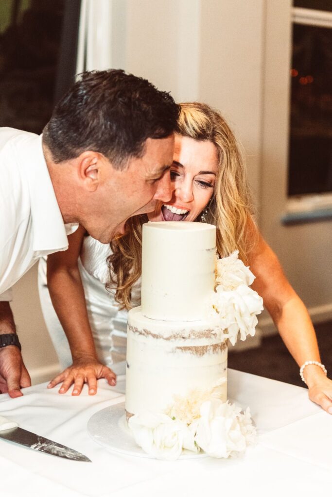 Bride and groom having fun with their wedding photography
