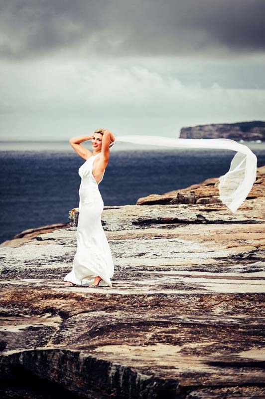 Bride and groom portrait on the cliffs