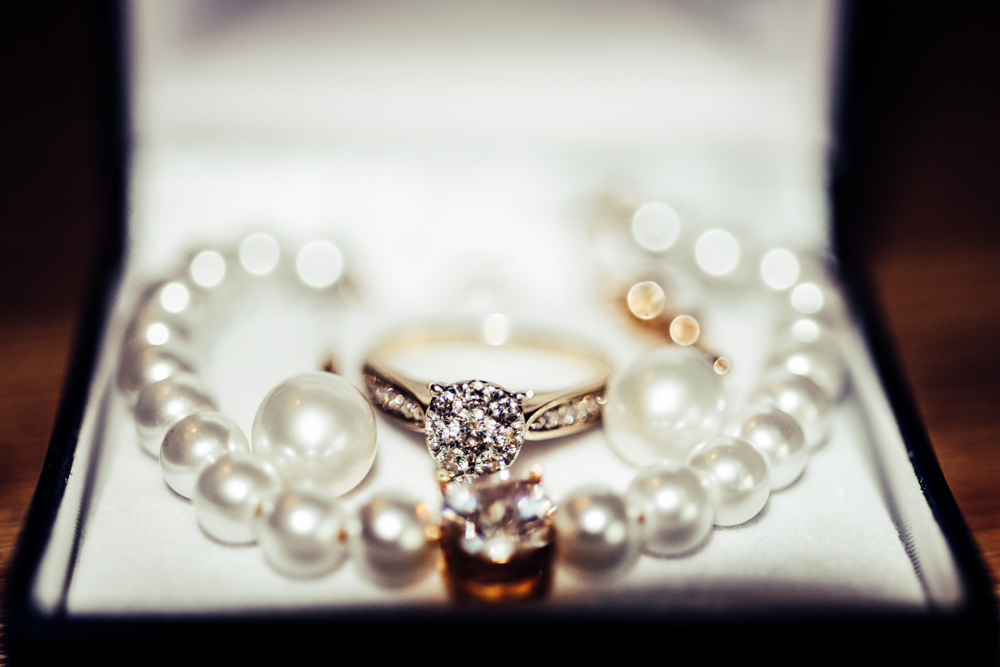 Wedding rings and brides necklace