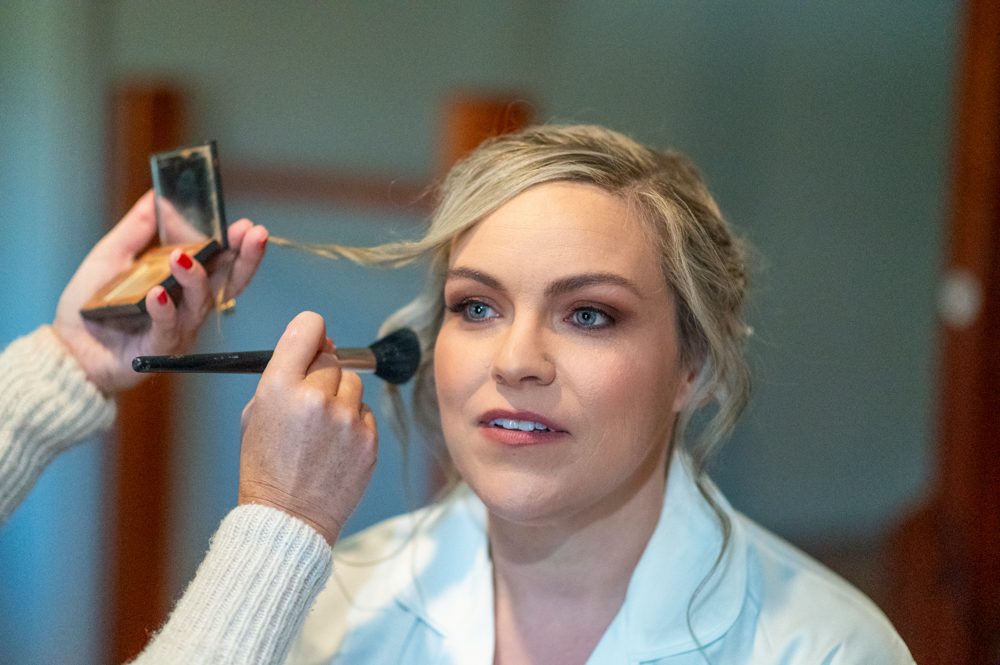 Bride having her makeup done