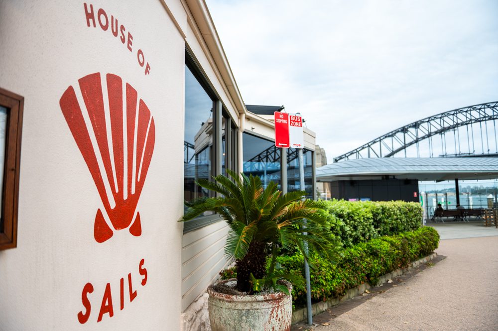 Bride and groom at Sails on Lavender Bay wedding venue overlooking Sydney Harbour and the Harbour Bridge