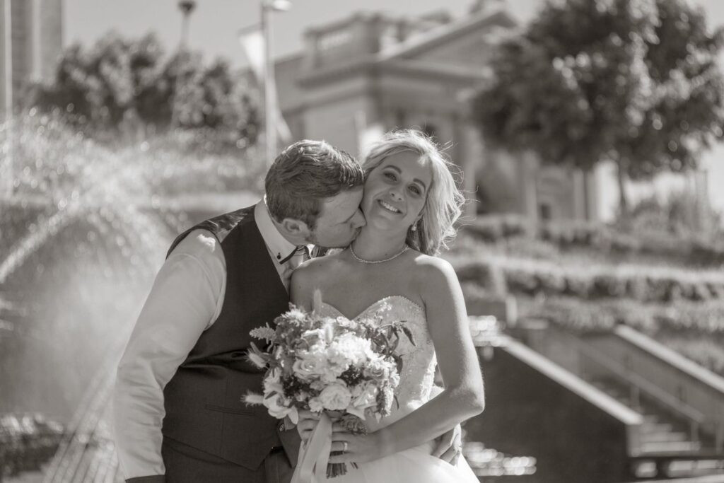 bride and groom during their Newcastle wedding in Civic park