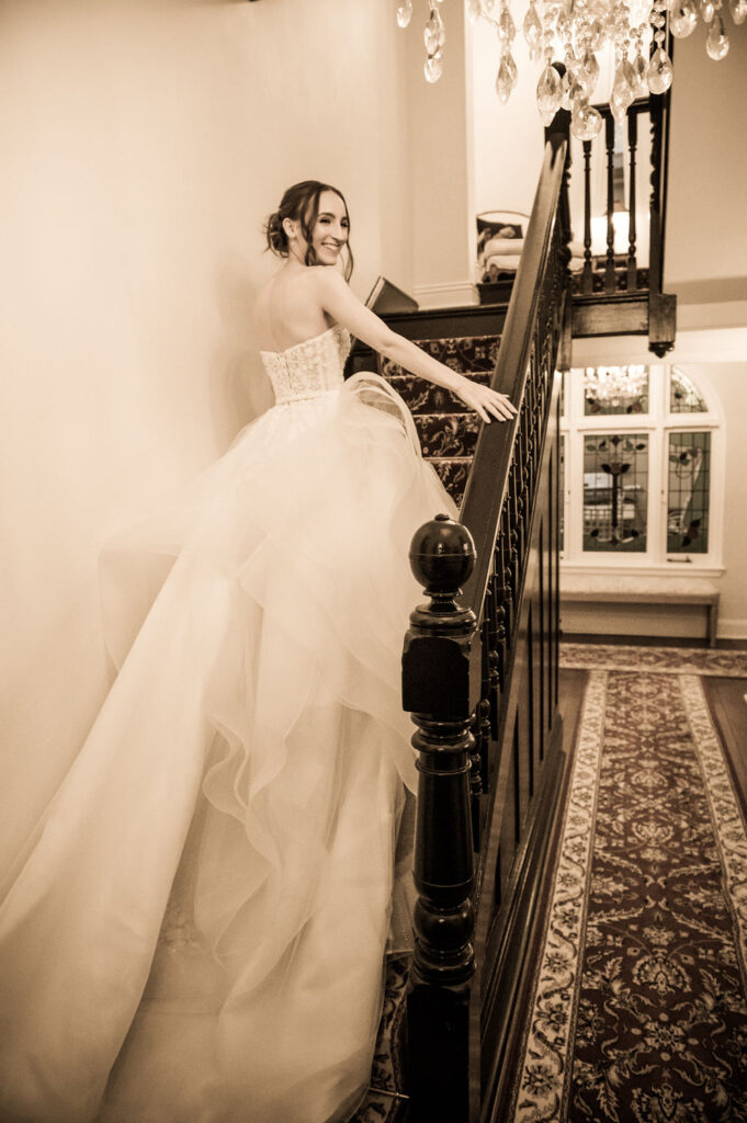 bride on stairs at Lords Estate