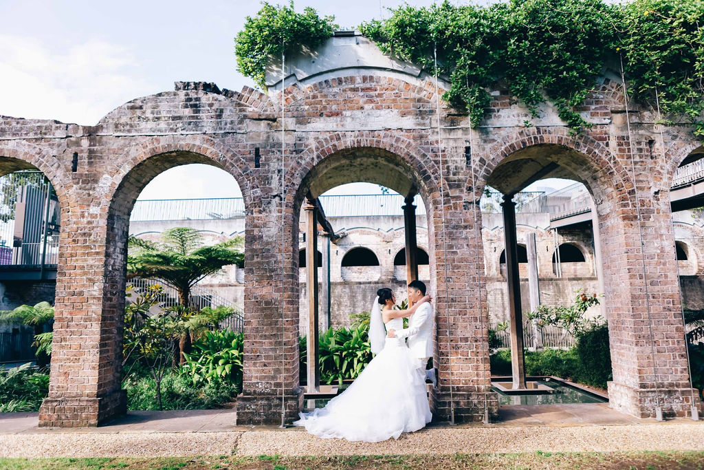 Sydney wedding photographer with couple in derelict building