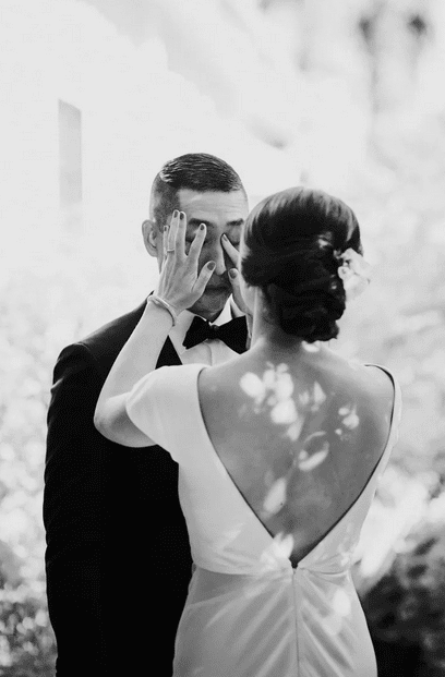 Bride and groom preparing on wedding morning