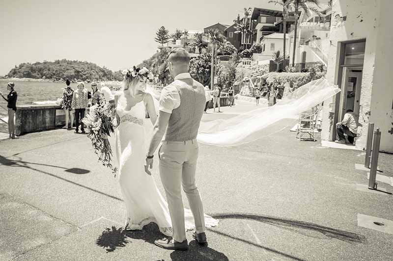 wedding photography packages in Sydney with bride and groom on Manly beach